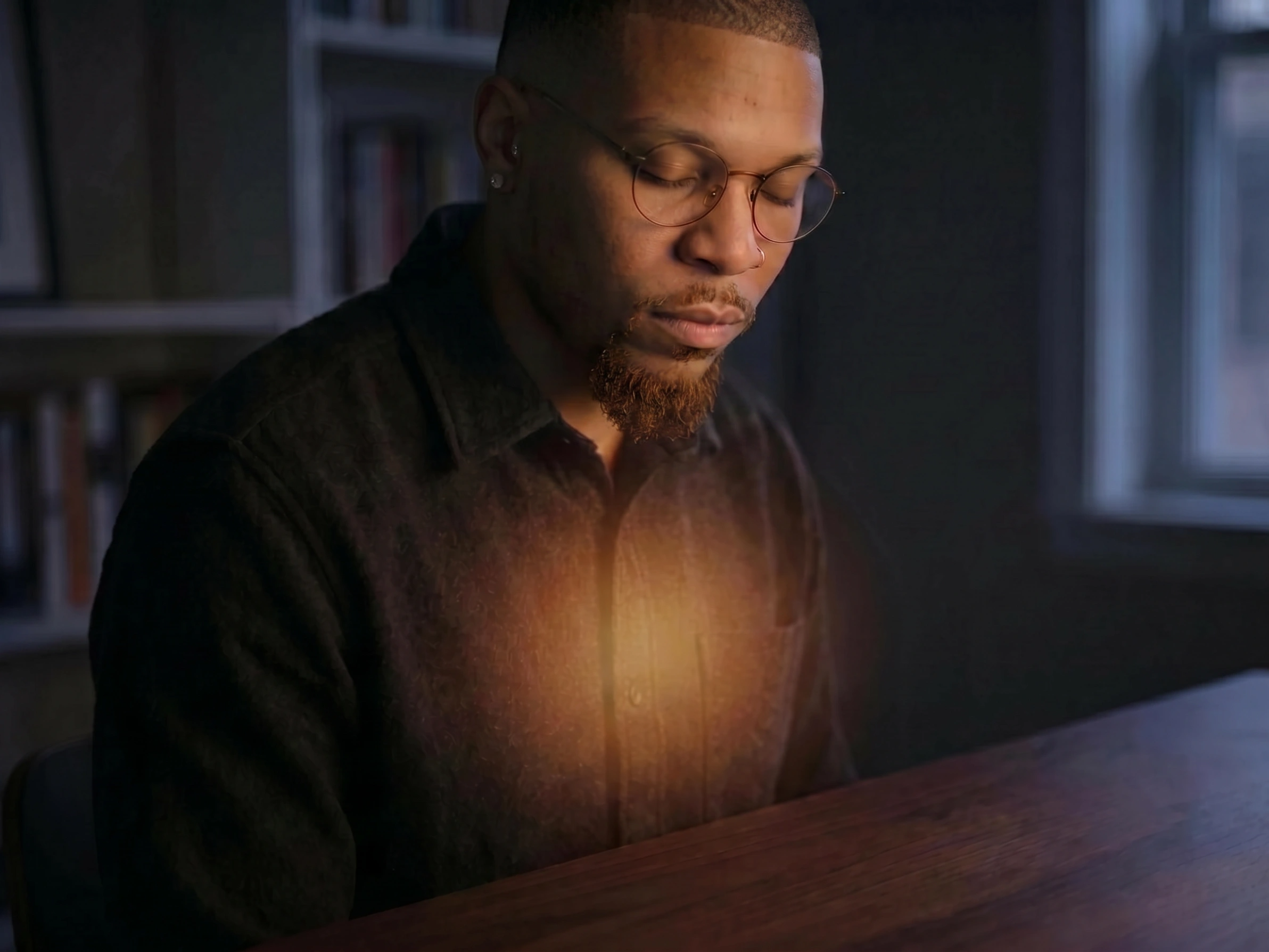 Antonio Matta, mental health ghostwriter and content creator, seated at a desk with warm light radiating from within — a visual metaphor for expertise not yet seen. Founder of Content Done Write, trauma-informed peer support counselor, and mental health content strategist helping therapists, treatment centers, and nonprofits find their voice online.